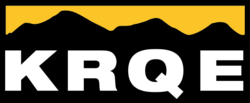 KRQE News Logo with black mountain silhouette yellow background and white letters