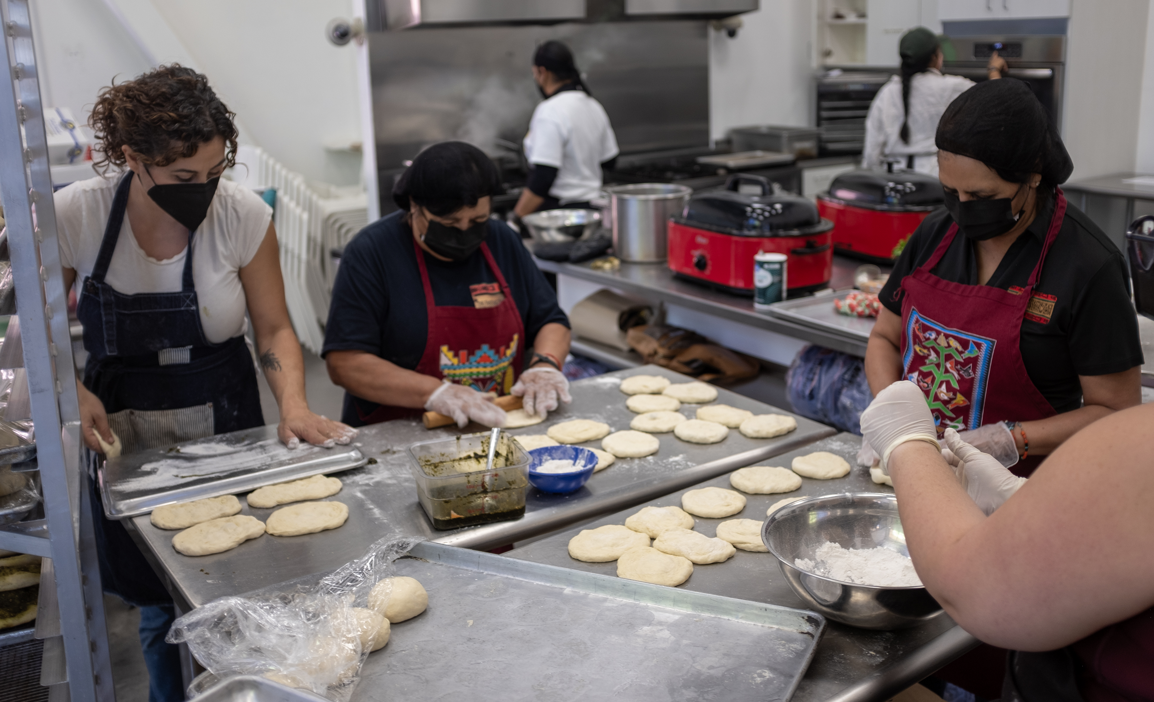 Chefs Reem Assil and Norma Naranjo work together in Three Sisters Kitchen.